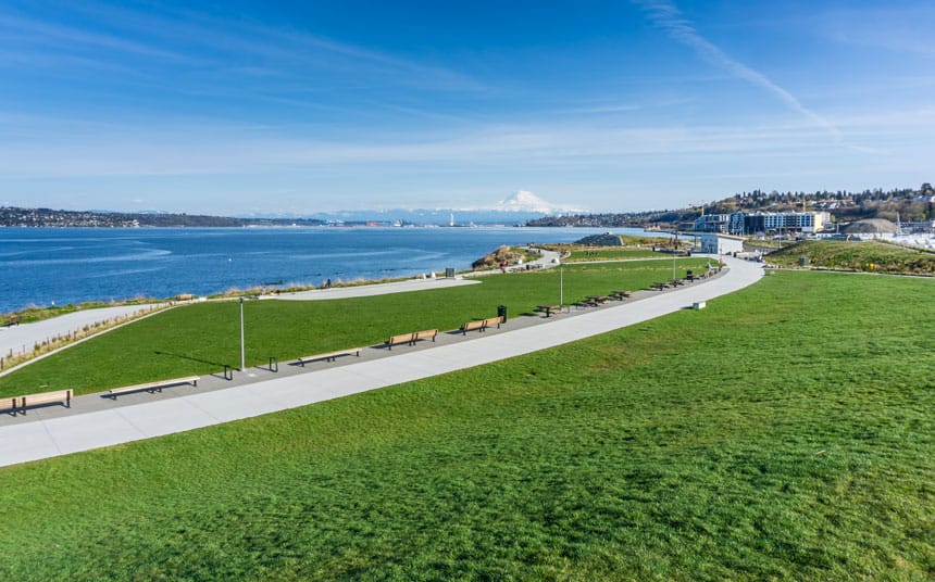 A panoramic view of Dune Penninsula Park with Mount Rainier in the distance.