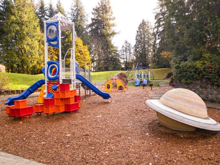 Kids on the Eastside of Seattle love playing at the North Kirkland Community Center Space Themed Playground, where they can jump off of Saturn!