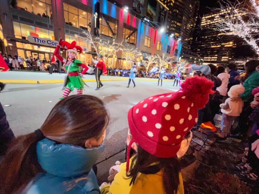 Snowflake Lane Bellevue Toddler watching the holiday dancers