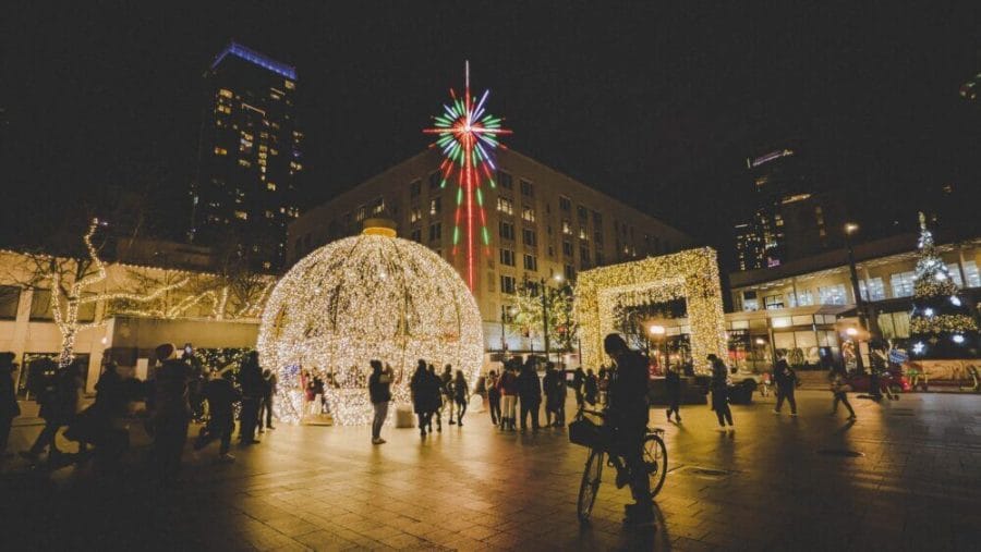People enjoying the holiday lights at Westlake, Seattle