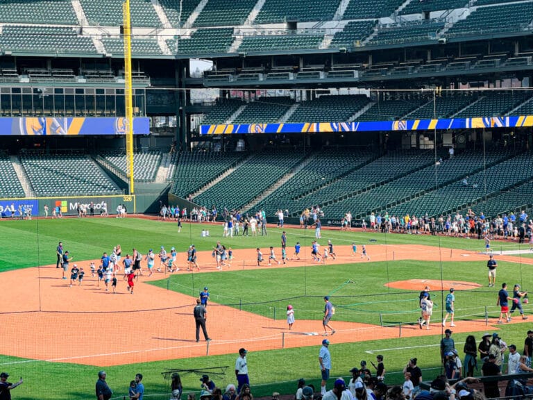 Mariners Baseball game Seattle, Kids Run Around The Bases, photo from the stands, more then 20 kids on the field running