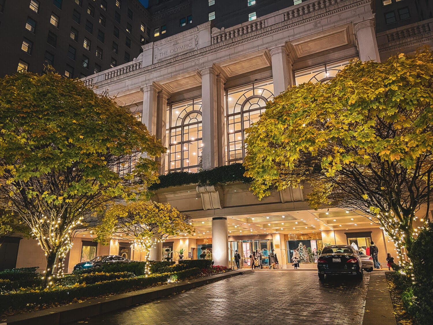 Fairmont Hotel in Seattle at Night with Christmas trees in the window