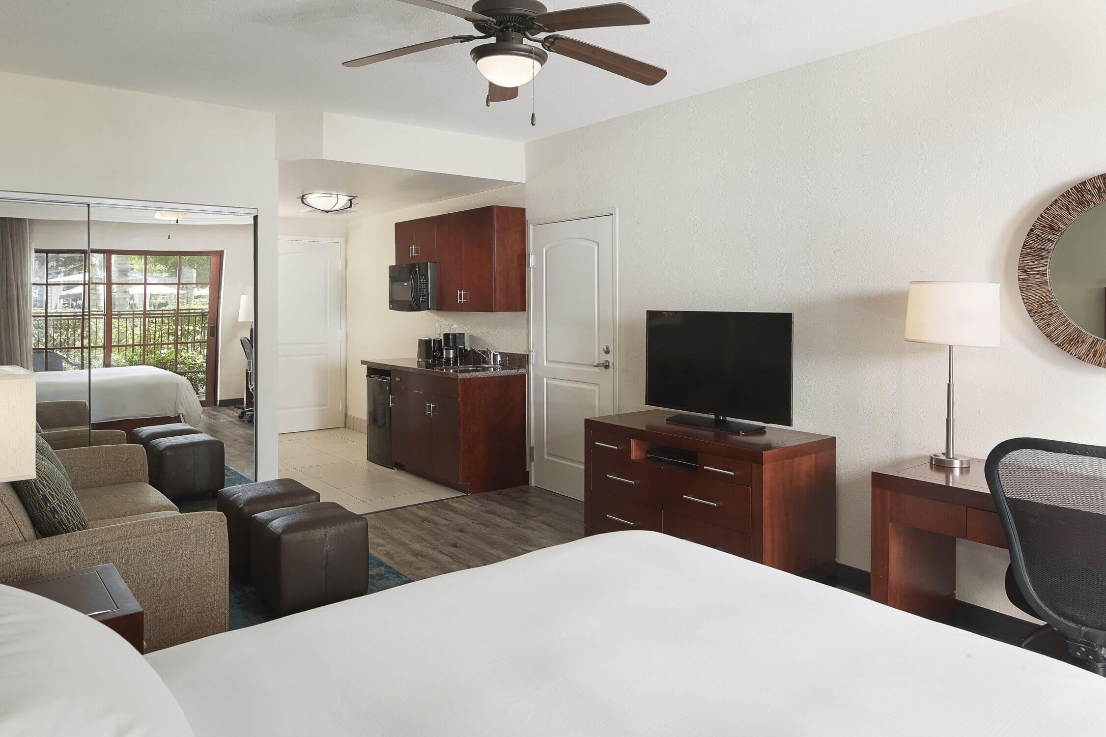 Interior of a family condo at MarBrisa Carlsbad Resort, featuring 1 bedroom and a full kitchen.