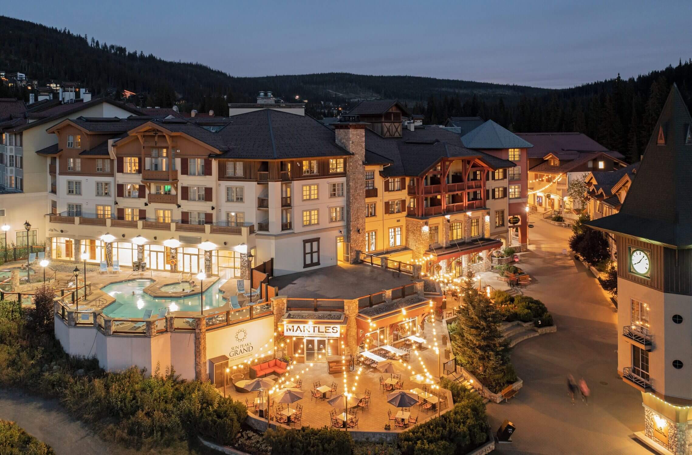 The Sun Peaks Grand Hotel & Conference Centre in British Columbia offers a luxurious and family-friendly stay during the winter ski season. Located in the heart of the pedestrian-only Sun Peaks Village with true ski-in/ski-out access, the hotel features spacious rooms and suites, some with kitchens—ideal for families. Amenities include a heated outdoor pool, three hot tubs, ski valet, and on-site dining at Mantles Restaurant. Just steps from the slopes, it’s a top pick for a stress-free and memorable family ski vacation.