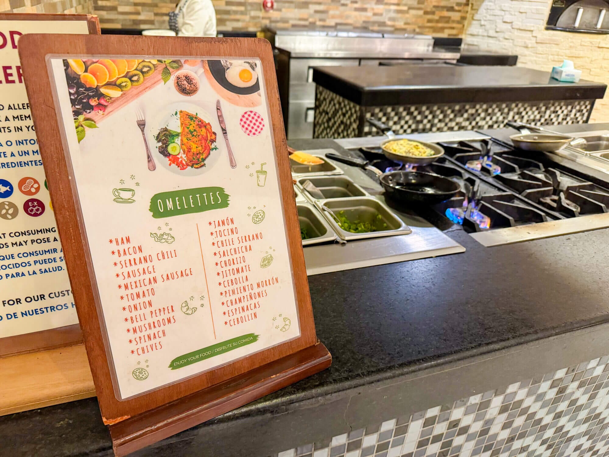 Custom omelets sizzling on the grill at the Dreams Vallarta Bay Resort breakfast buffet, where guests can choose from a wide variety of fresh toppings including cheese, veggies, ham, and more. The breakfast spread is generous and kid-friendly, featuring everything from pancakes and waffles to tropical fruit, fresh pastries, yogurts, and juices. There’s even a smoothie bar and rotating hot dishes like chilaquiles and breakfast burritos for a local touch. With ocean views and attentive service, it’s the perfect way for families to fuel up before a day of poolside fun or exploring Puerto Vallarta