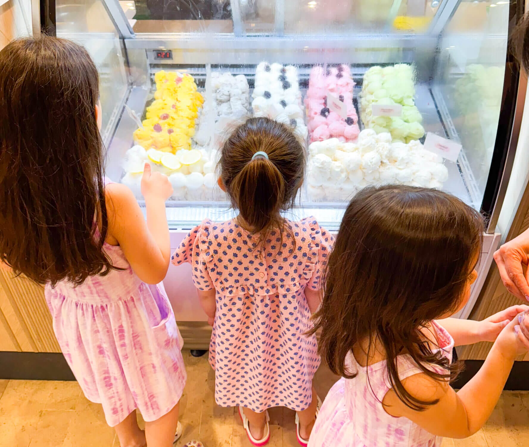 Three young girls eagerly peer into the glass display at Coco Café in Dreams Vallarta Bay Resort, deciding which ice cream flavor to choose before bedtime. This cozy dessert spot quickly became the kids’ favorite nightly tradition, offering a variety of sweet treats—from soft-serve ice cream and toppings to churros and pastries. Located just off the open-air lobby, Coco Café is a must-stop for families staying at this all-inclusive resort in Puerto Vallarta.