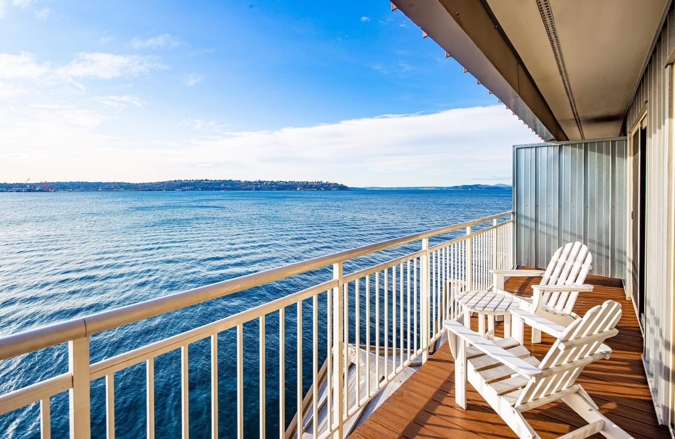 View from the Edgewater Hotel balcony directly over Elliott Bay, offering a unique waterfront stay—featured in our guide to the best places to stay with kids in Seattle.