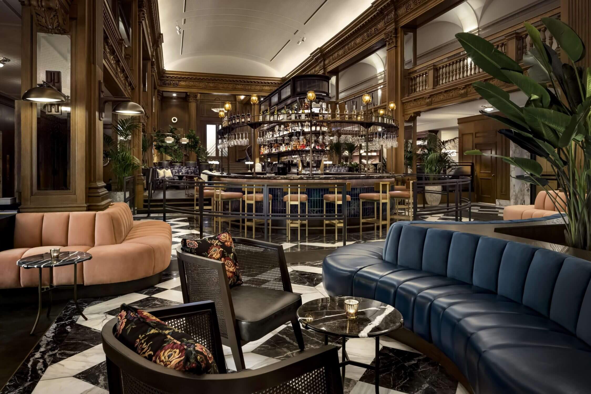 The elegant lobby bar at the Fairmont Olympic Hotel in downtown Seattle, known for its inviting ambiance and delicious afternoon tea service that’s a hit with kids and families. A perfect spot to relax after exploring the city.